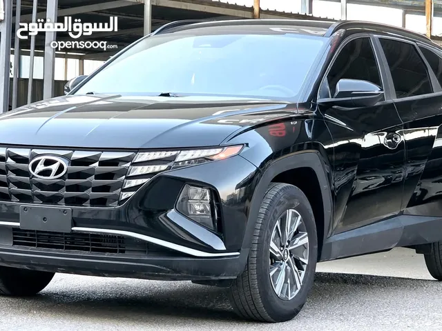 2022 هيونداي توسان هايبرد دفع رباعي مع دفلوك فحص كامل مميز جدا يصلح للاعفاءات الجمركية