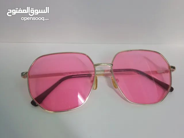 نظارات ورديه مع مسكه ذهبيه اللون pink glasses