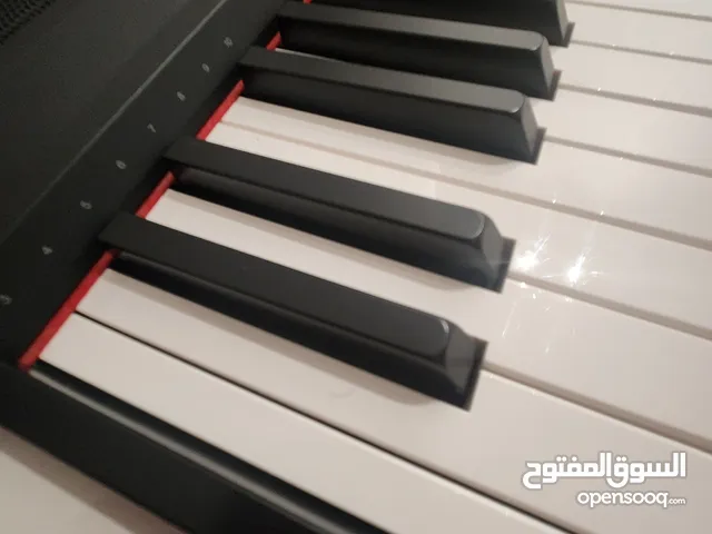 Yamaha P-105 Digital Piano – Excellent Condition with Accessories بيانو ياماها P-105 بحالة ممتازة