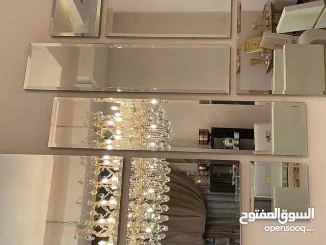تركيب السيكوريت والمرايا وجميع أعمال الزجاج والألمنيوم بجودة عالية"