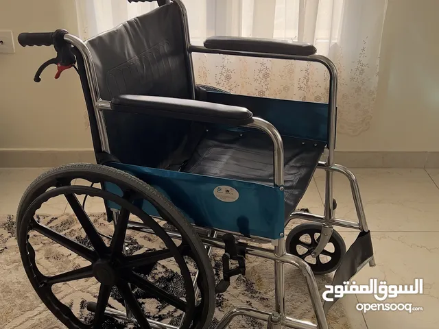 3 weeks old wheelchair + wooden crutches for sale