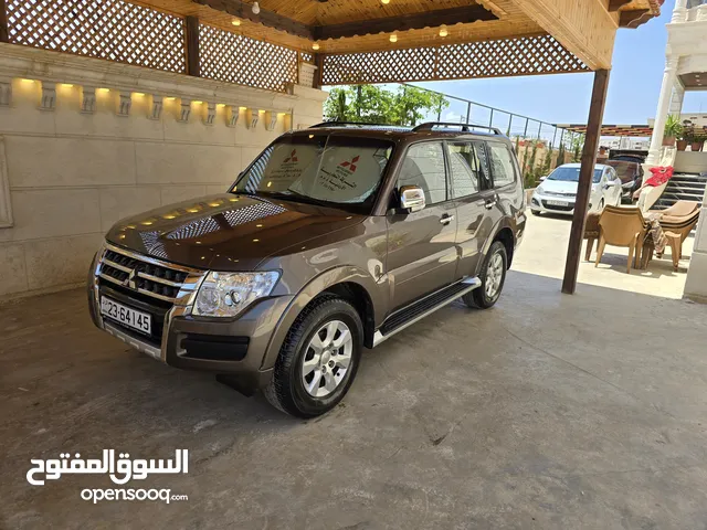 ميتسوبيشي باجيرو 2016 وارد الشركة مالك 1 فقط عداد 46km فحص 7 جيد كرت ابيض