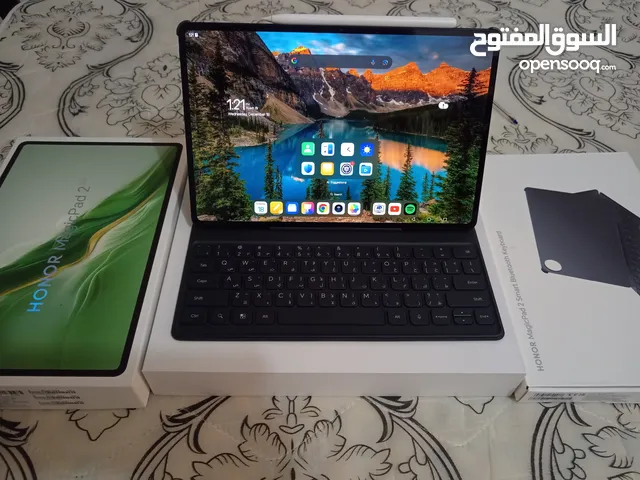 Honor Magicpad 2 with keyboard, stylus, charger and boxes.