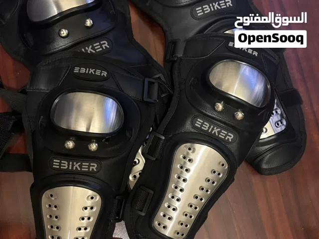 حماية للذراعين والركبة لراكبي الدرجات النارية
