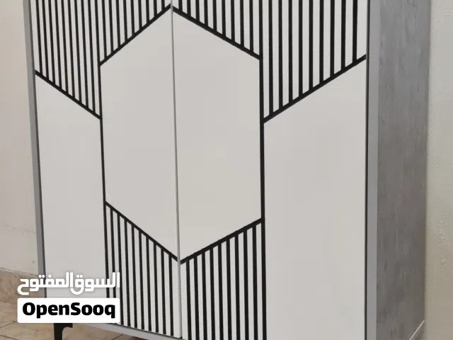 Shoe cabinet and wall calligraphy for sale