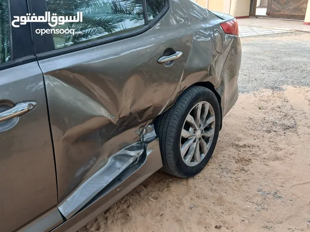 مطلوب باب يسار اللي خلف السائق اوبتيما وارد امريكا نفس اللون اللي في الصورة