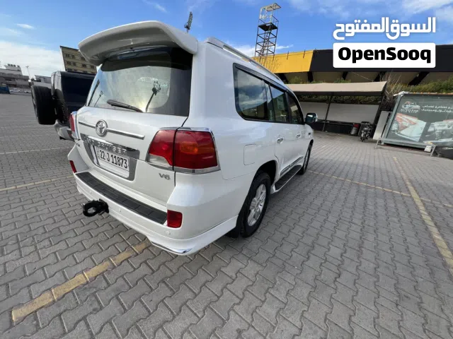 لاندكروزر GXR 2013 لون ابيض صدفي