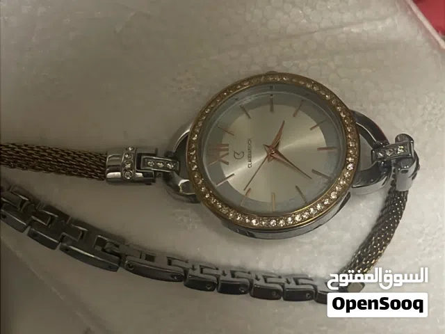 ساعه كلوديا كوتش نظيفه