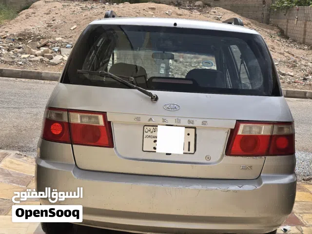 2003 كيا كارينز Standard