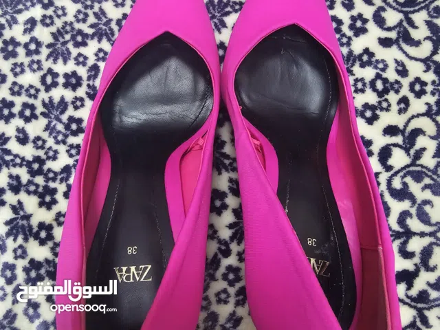 Pink With Heels in Abu Dhabi