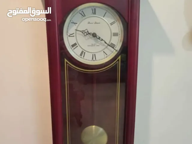 ساعه حائط جميله ............