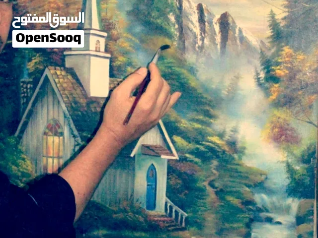 .رسام وفنان يستخدم الألوان الزيتية والرصاص
