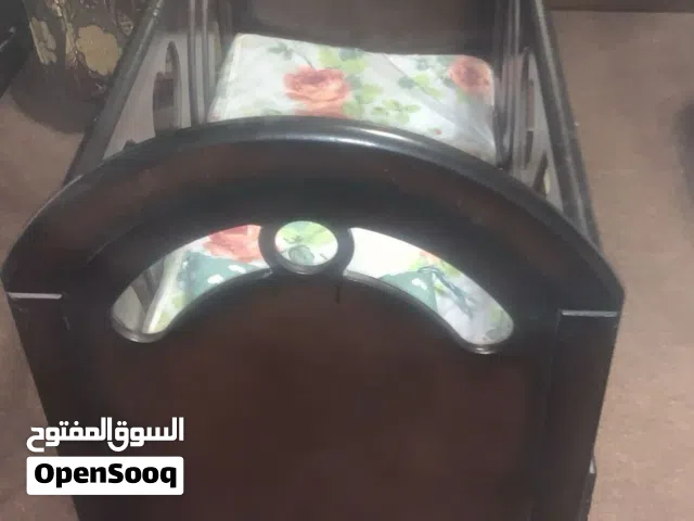 تخت بيبي خشب زان بحال الجديد
