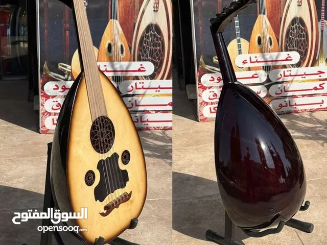 عود الحكيم صناعه زرياب صنع خصيصا ل معرض جواهر موسيقى زند عياري مع وريشه بسعر مغري جديد