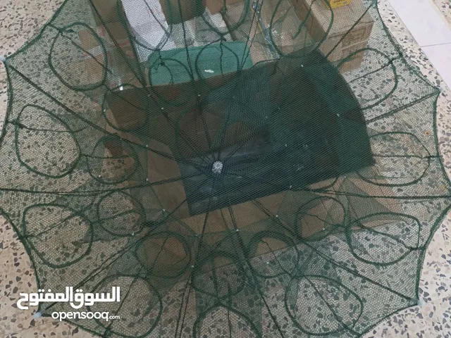 شبكه كمظله تستعمل في اصطياد السمك