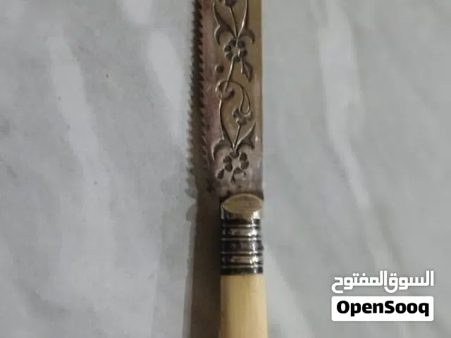 سكاكين مطلية فضة ومقبض عاج