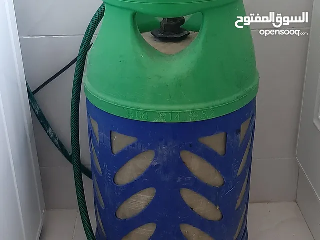 اسطوانة غاز مع الخرطوم والمنظم
