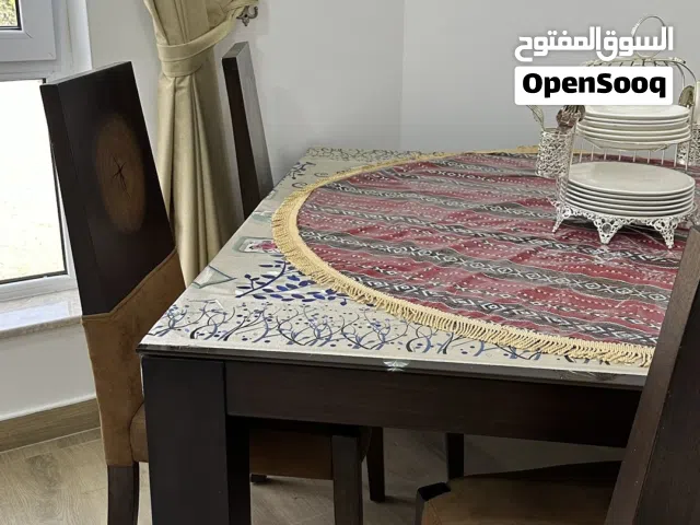 طاولة طعام خشبية مع 8 كراسي