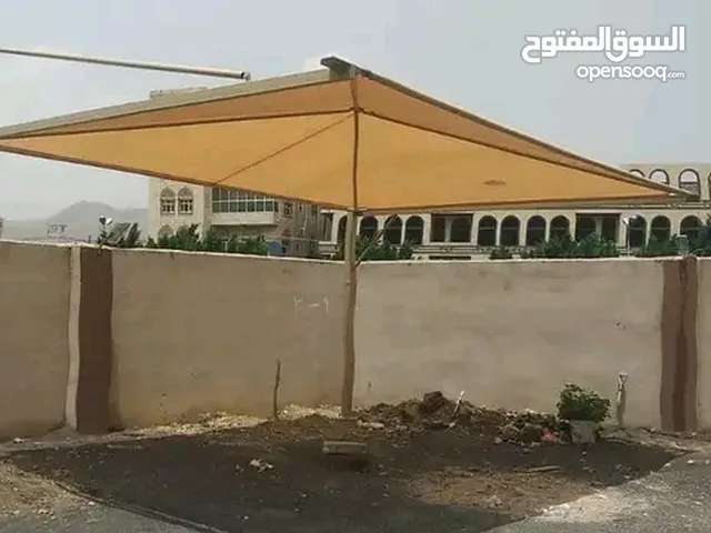 مظلات سيارات ضد الشمس والمطر