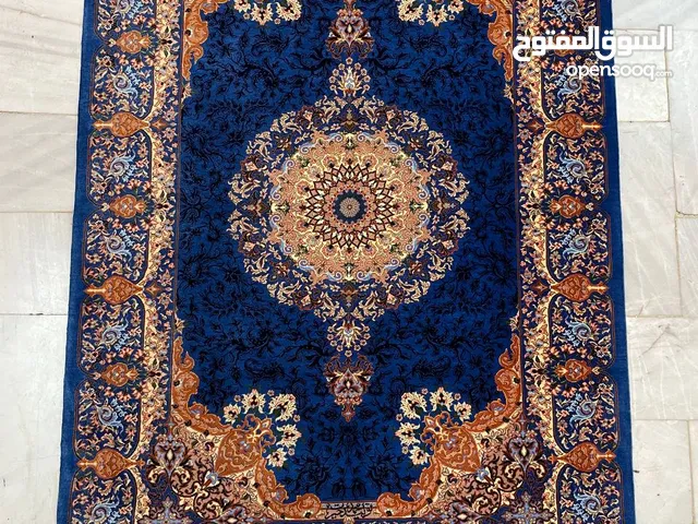 تصنيع السجاد الإيراني المنسوج يدويا (حرير قم) Manufacturer of Hand-woven Iranian Carpets (QOM Silk)