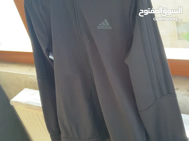 original black adidas jacket. size 13-14 years (Large) for more information contact me