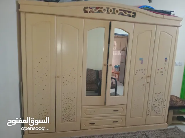 having furniture set in good condition near police station round board