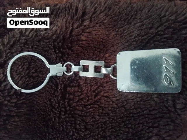 ميدالية مفاتيح فضة لسيارة بورش 911