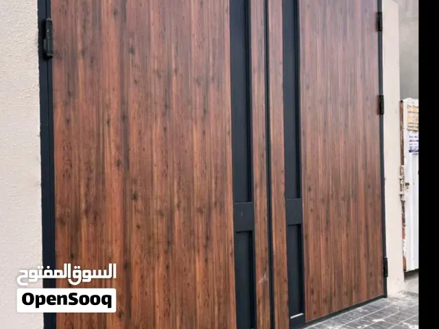 أبواب كلادينج أبواب المنيوم شبابيك أبواب حديد