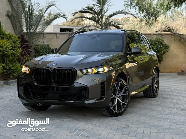 BMW X5 50e ترخيص   محرك 3000 هايبرد plug in/يقطع على الشحنه 100 كيلو متر