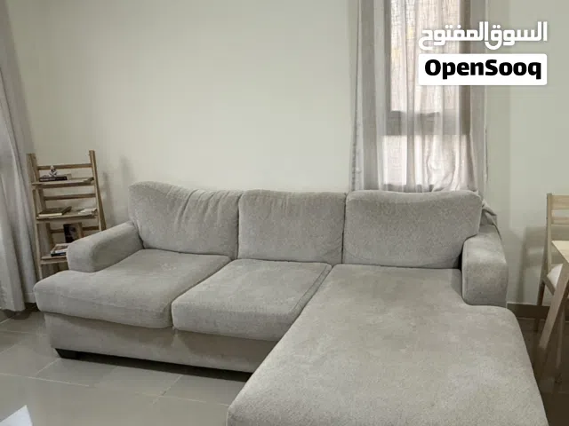 Light grey 3-seater L-shaped fabric sofa with chaise - good condition