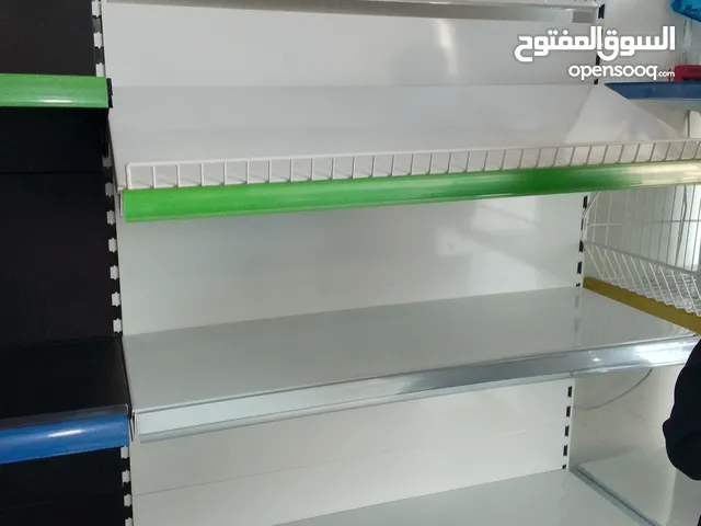 رفوف تخزين مستودع بيت سوبر ماركت صيدلية بقالات خانات دواليب