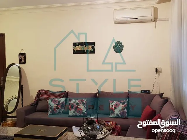 شقة طابق ارضي معلق في ربوة عبدون قرب الشرطة النسائيه