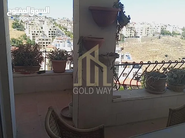 شقة أرضية (طابقية)350م مع حديقة في أرقى مناطق عبدون بتشطيبات مميزة/ref 7005
