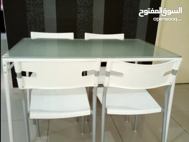 4 seater Ikea glass top dining table for sale 25KD