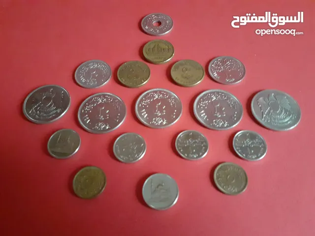 15 عملة معدنية مصرية قديمة إصدارات وفءات مختلفة