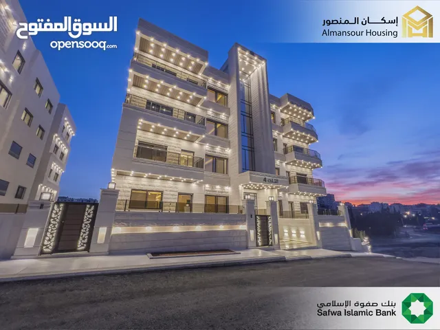 شقة شبه أرضية 150م2 فاخرة للبيع في طريق المطار/ مشروع التلة 4 ( إسكان المنصور )