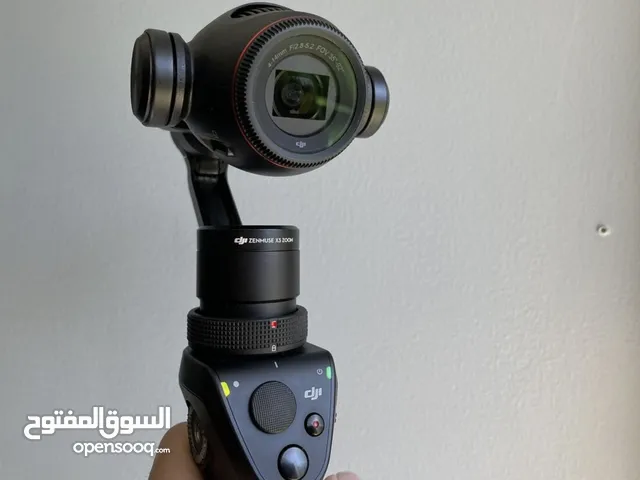 Osmo + Zenmuse X3 Zoom بكاميرا ثلاثية المحاور وكاميرا 4K ، وهو مصمم ليتم تثبيته على مقبض D