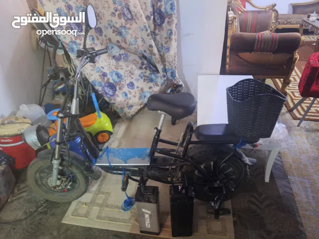 دراجه كهربائيه مع بطاريه اضافيه