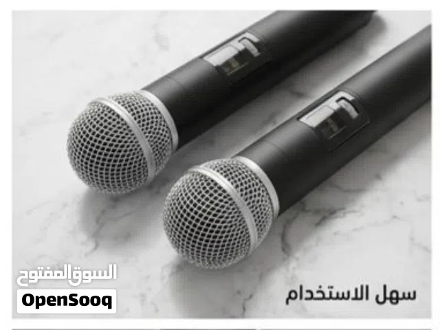 ميكروفون لاسلكي مزدوج محمول باليد  المكونات : ميكروفون لاسلكي (عدد 2): ميكروفونات ديناميكية محمولة