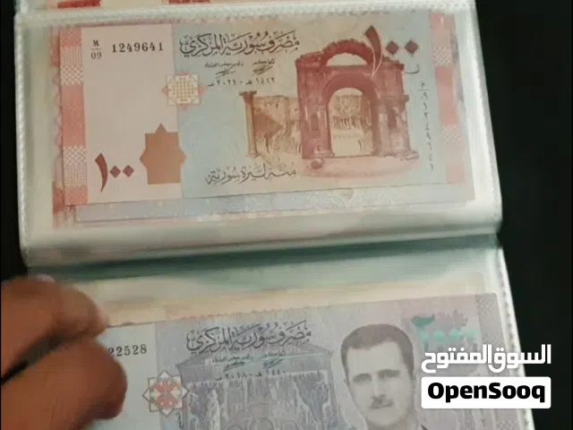 2 Albums of 100 Banknotes and 120 coins