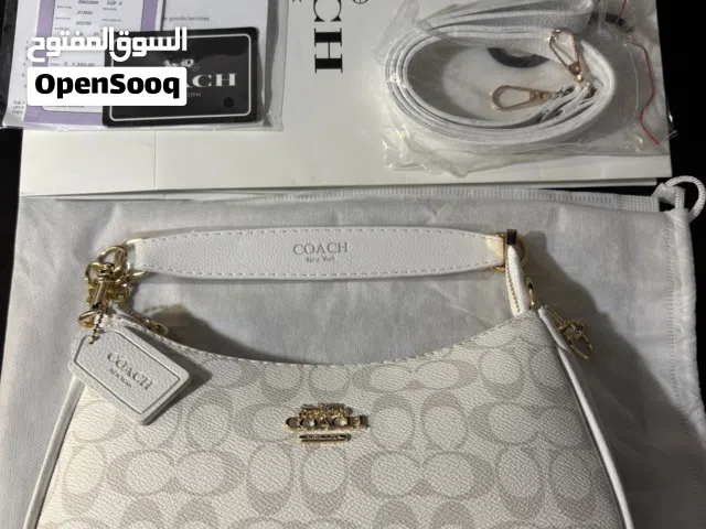 COACH Teri Shoulder Bag in Signature Canvas featuring white leather trim
