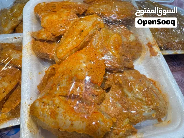 أجنحة متبلة جاهزة للشوي