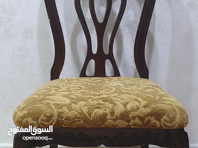 Eight brown chairs