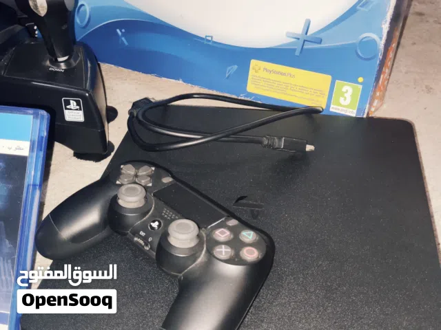 Ps4 with steering wheel and 3 cd games