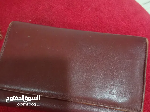 محفظه غوتشي جلد لون بني للبيع gucci