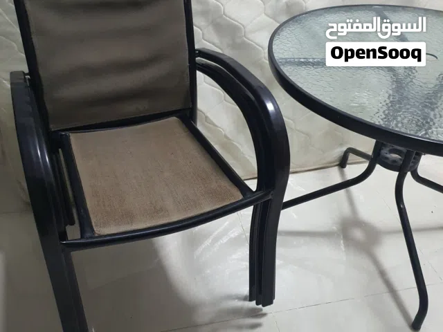 urgent sale glass table with 4 chairs