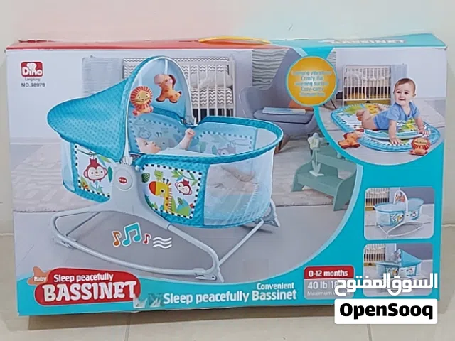 Baby sleeping peacefully bassinet