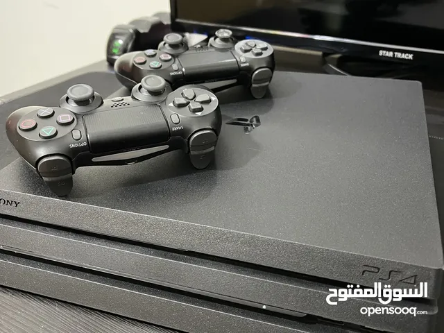 PS4 Pro 1TB 2 controllers and one charging station