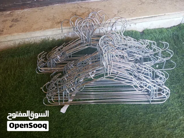 علاقات ملابس حديد