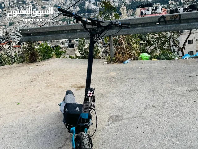 سكوتر كهربا 60 فولت 23 أمبير مطورين مطور امامي 1000واط وا المطور تاني 1200واط